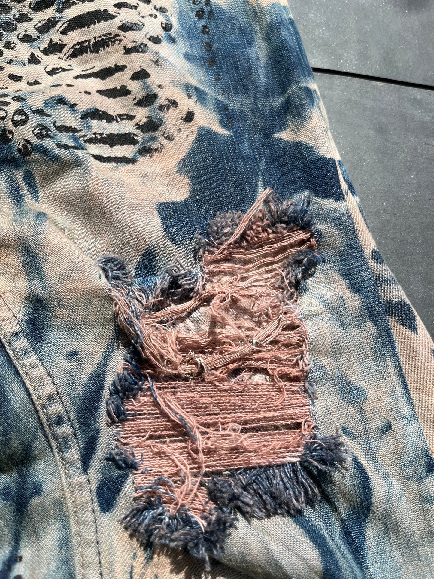 Brown reptilian denim