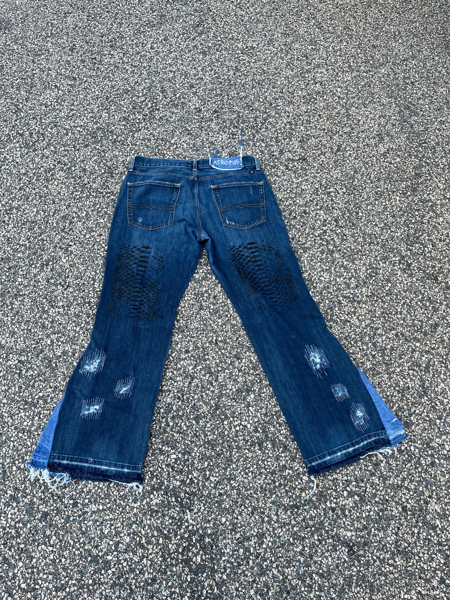 Faded reptilian denim