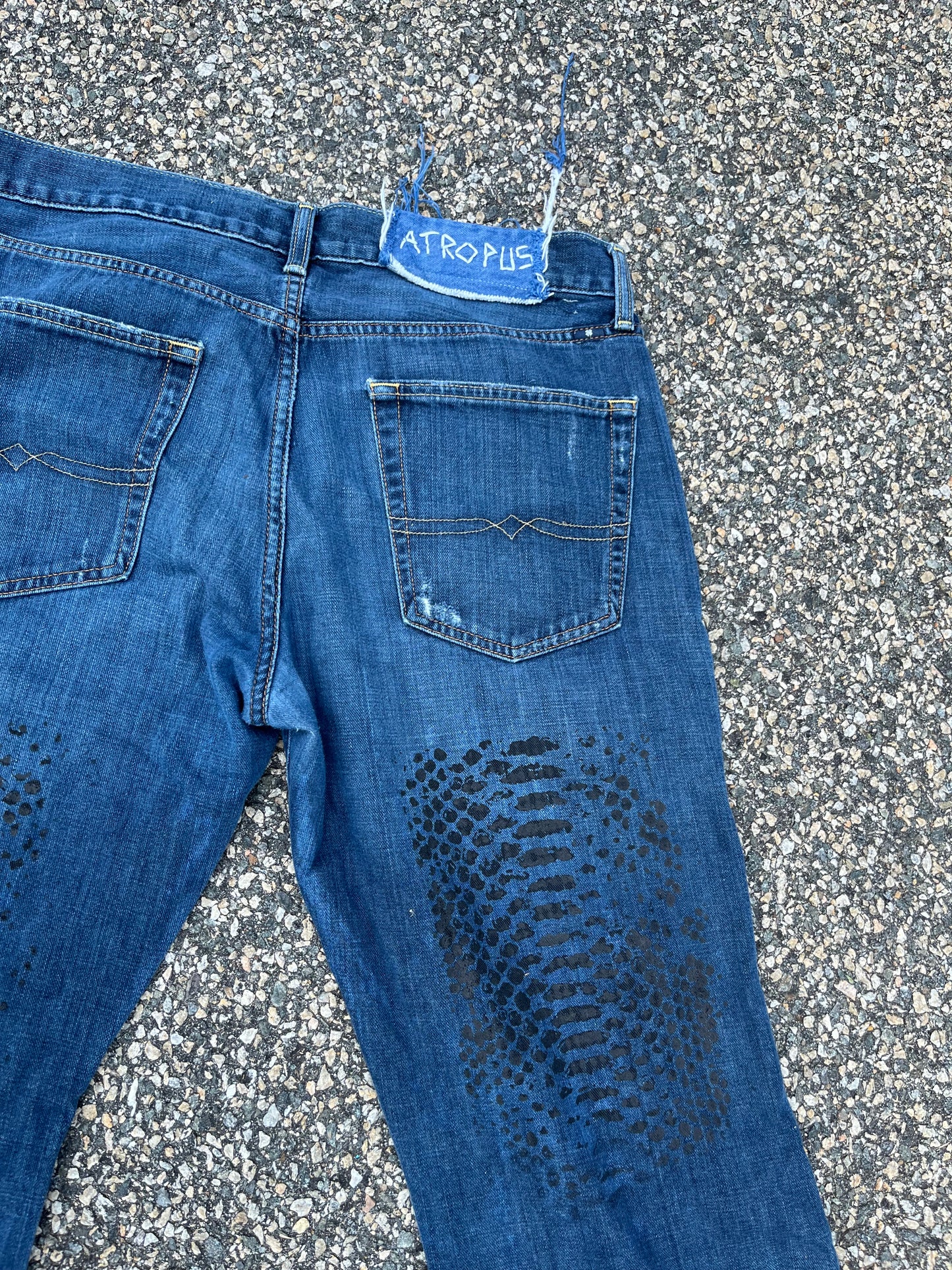 Faded reptilian denim